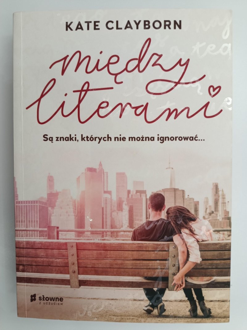 MIĘDZY LITERAMI - Kate Clayborn