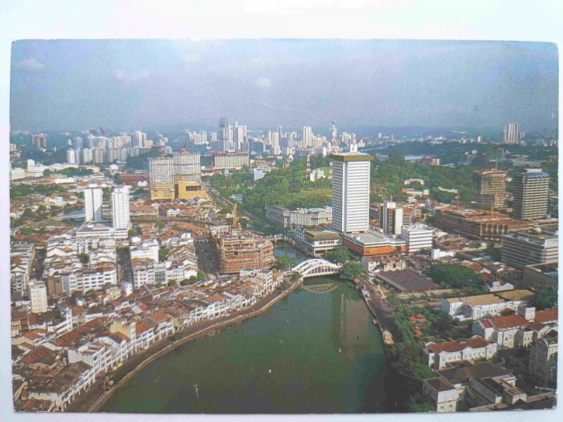 THE SINGAPORE RIVER WITH COMMERCIAL