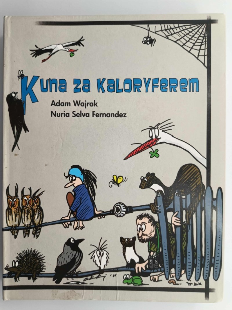 KUNA ZA KALORYFEREM - Adam Wajrak
