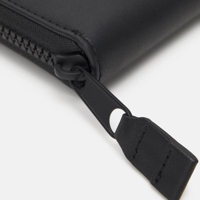 Portfel Tommy Jeans damski czarny na bilon banknoty karty skórzany