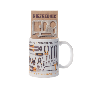 Kubek ceramiczny z napisem NIEZBĘDNIK TATY z narzędziem wielofunkcyjnym.